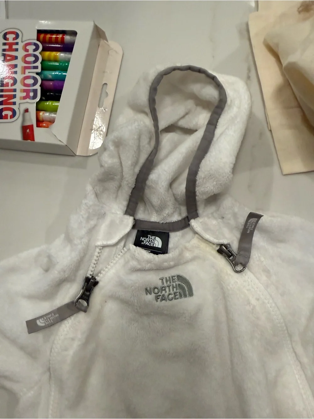The North Face White Fleece Baby One-Piece with Gray Trim